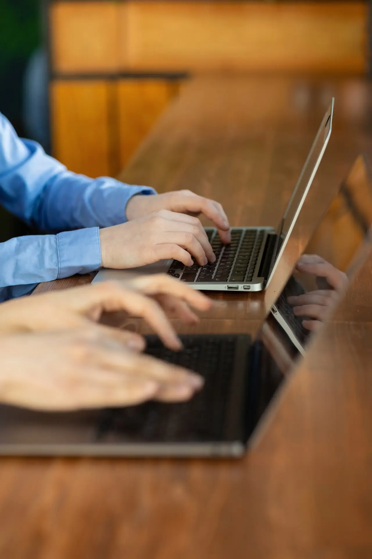 People working together on laptops