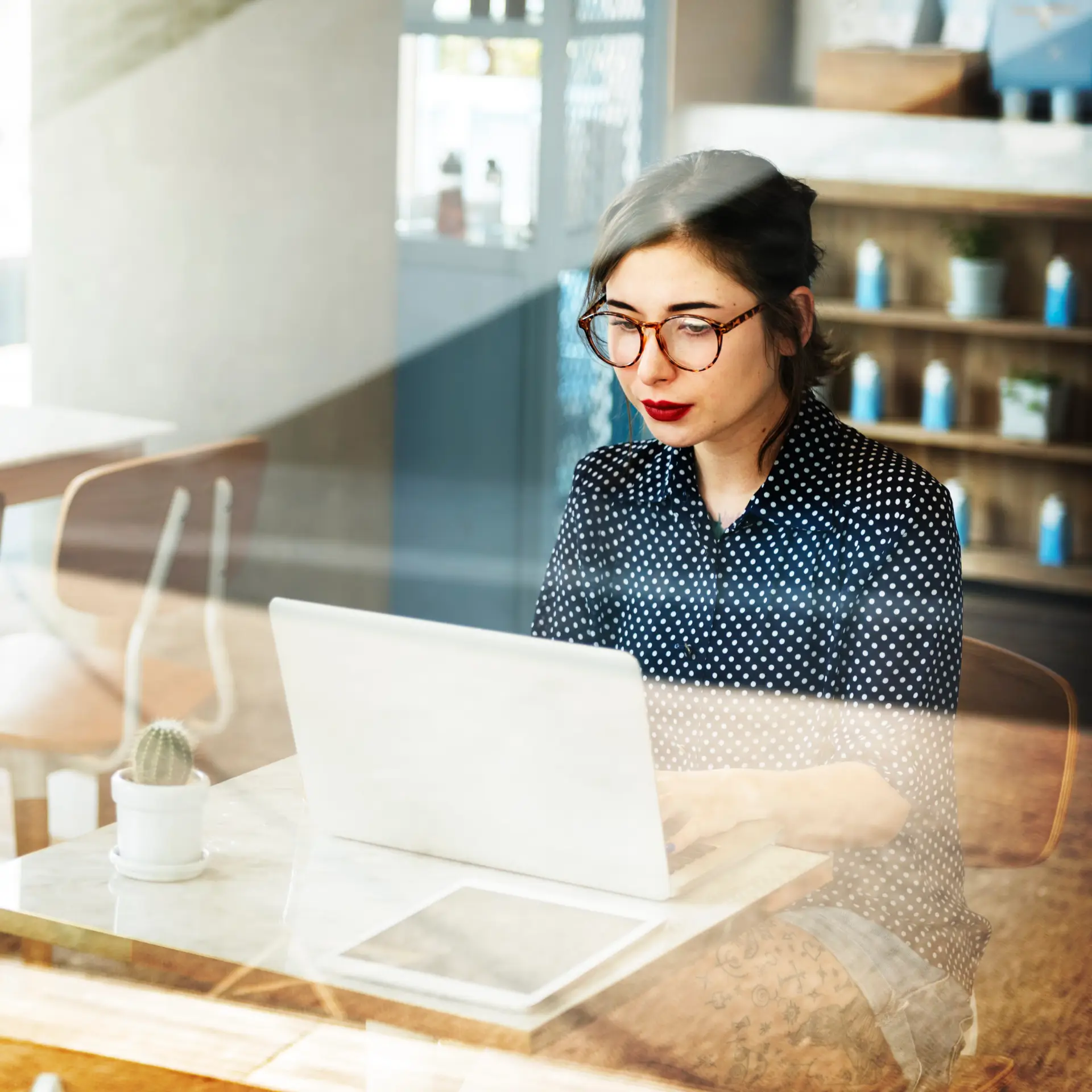 A founder working at her laptop